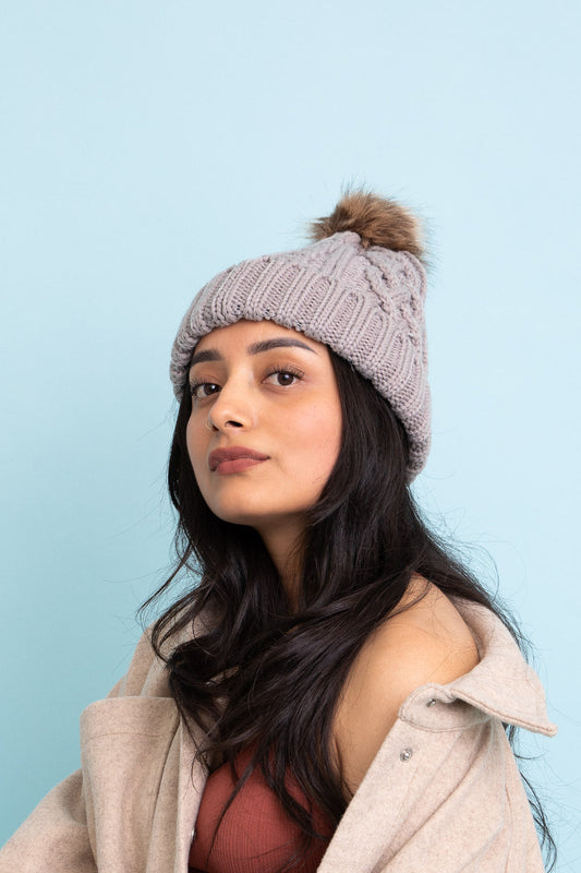 Cable Knit Beanie with Faux Fur PomWho says beanies have to be boring? Not us! Our Cable Knit Beanie with Faux Fur Pom is super cute and fun, and will keep you warm all winter long. The chunky knit faPeriwinkle AetherPeriwinkle AetherCable Knit BeanieCable Knit BeanieAccessoriesEzzyclick