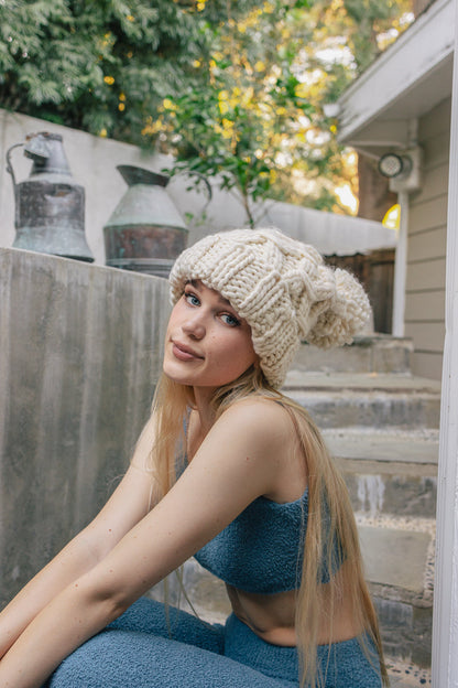 Oversized Chunky Knit Pom BeanieLooking for a winter fashion accessory that is both cute and fun? Check out our Oversized Chunky Knit Pom Beanie.This beanie is sure to keep you warm and stylish allPeriwinkle AetherPeriwinkle AetherOversized Chunky Knit Pom BeanieOversized Chunky Knit Pom BeanieAccessoriesEzzyclick